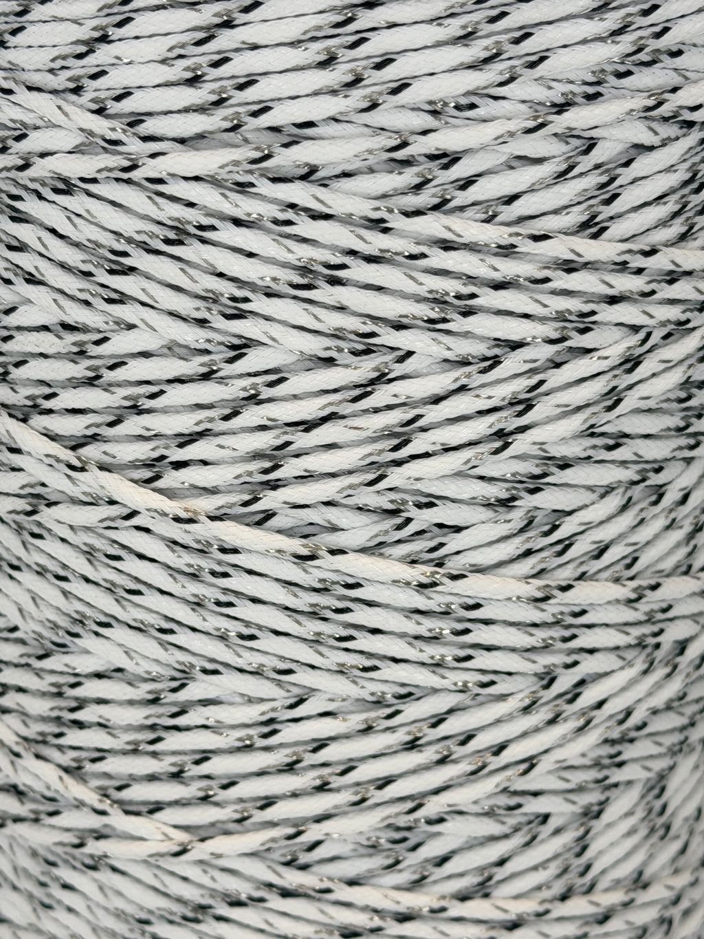 Close-up of gray and white textured yarn