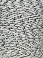 Close-up of gray and white textured yarn